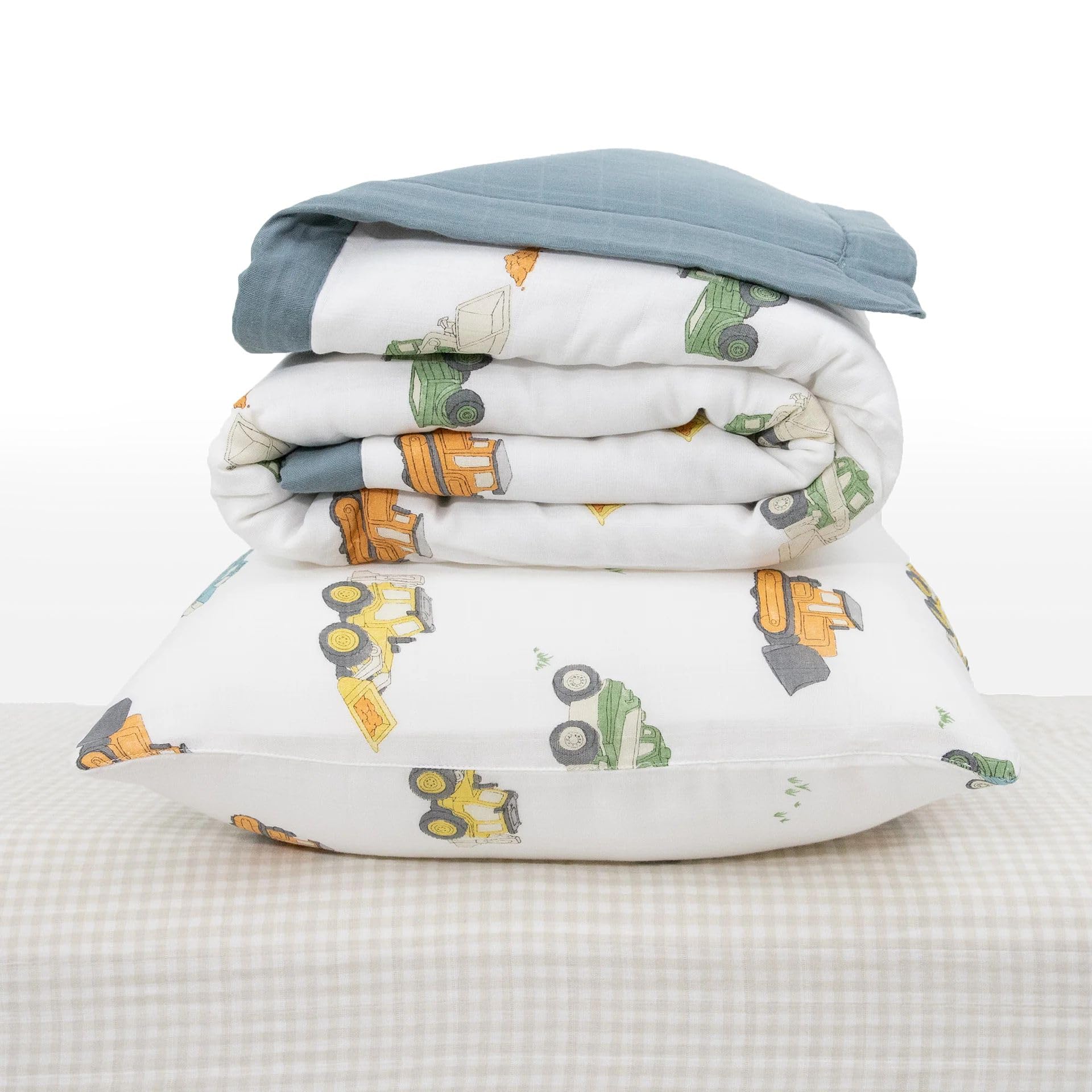 Little Unicorn work-trucks sheet demonstrates snug fit for crib mattresses.