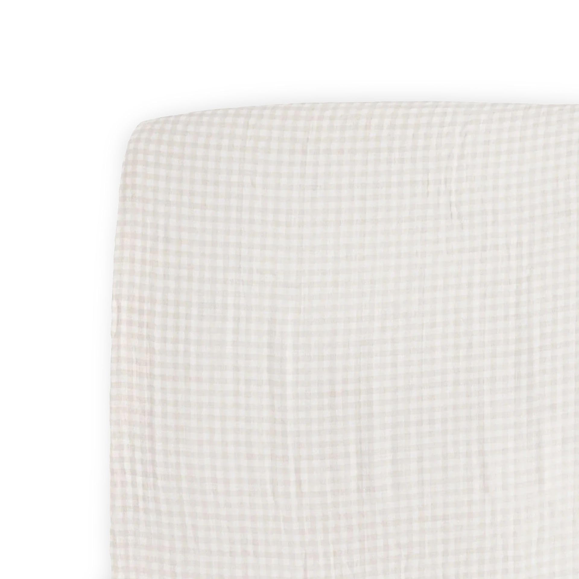 Little Unicorn work-trucks toddler-bed-fit highlights snug sheet on mattress.