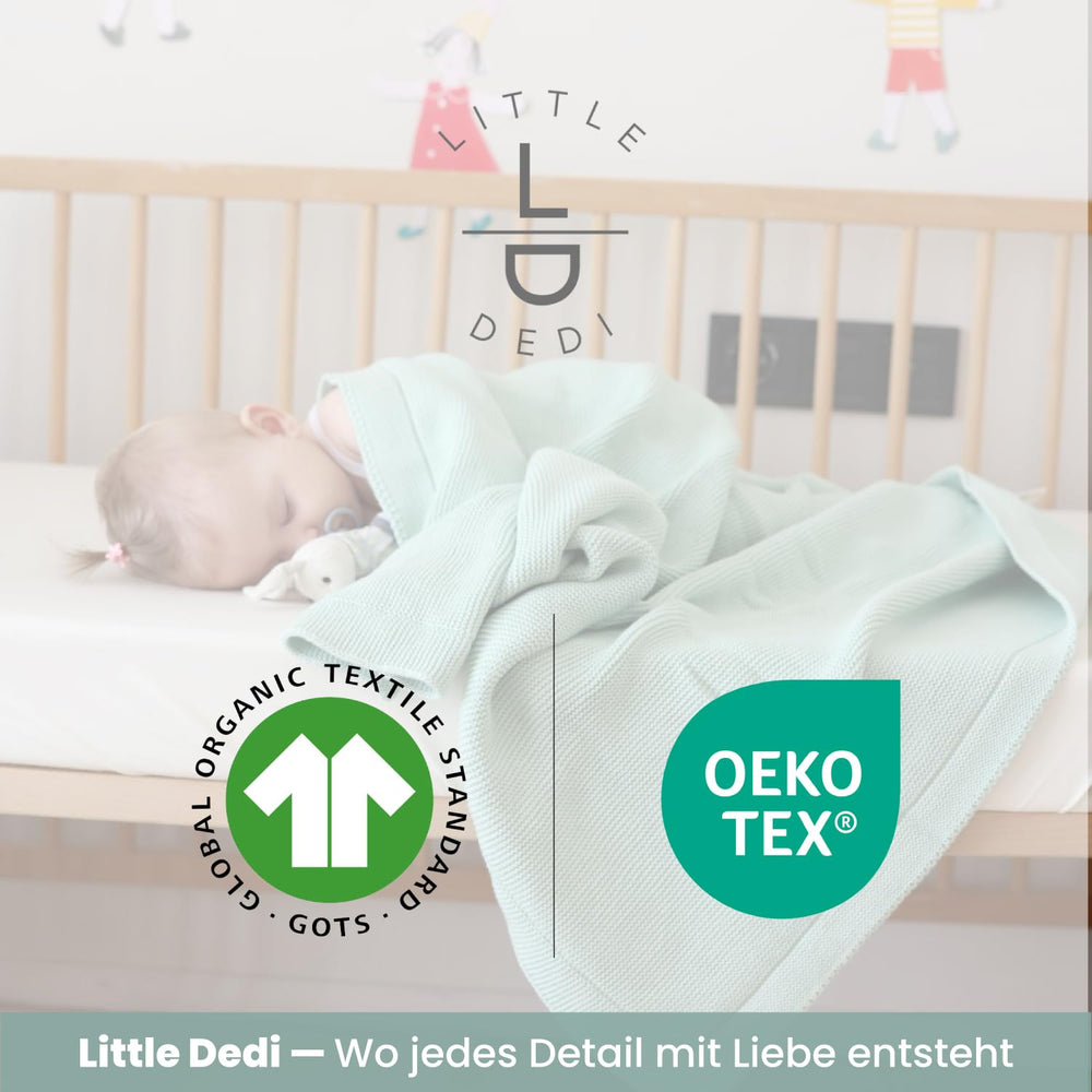Little Dedi flatlay showcases premium organic cotton blanket in sage