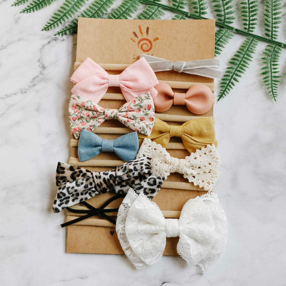 LittleJoJo mustard solid bow headband; versatile accessory from newborn to toddler.
