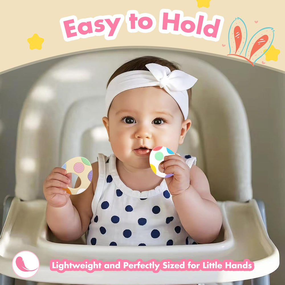 LittleLamb Easter-themed teether baby-hand shot emphasizes portability for on-the-go soothing