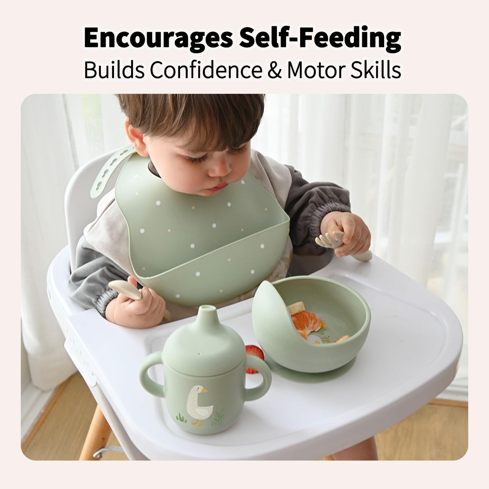 Little Rawr deep-pocket bib captures dropped food for easier cleanup.