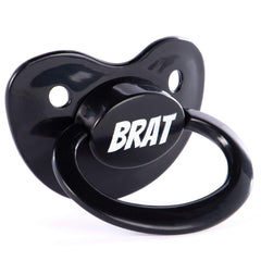 Littletude adult pacifier with large teat for soothing bedtime rituals.