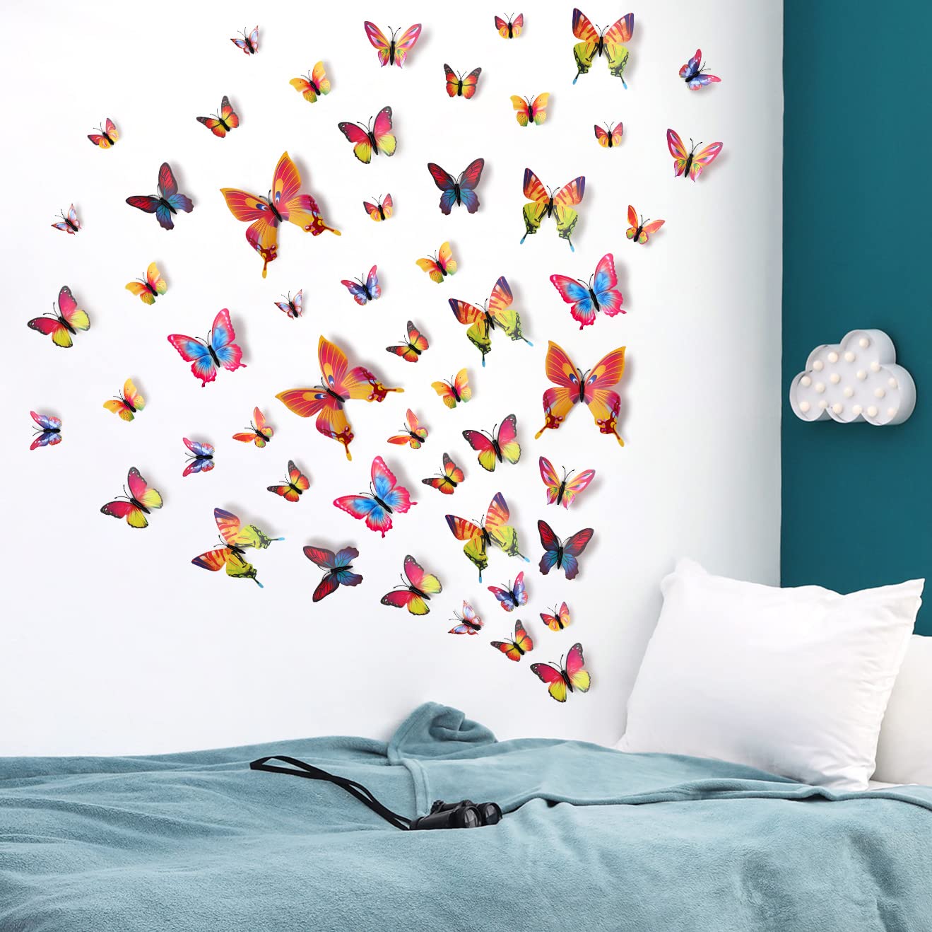 LiveGallery butterfly decals on a door using double-adhesive foam.