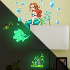 LiveGallery glow mermaid stickers around a door frame for nursery decor and gentle glow