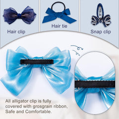 LMYMHMLM closeup of handmade blue hair bows.