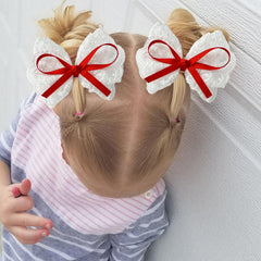 LMYMHMLM red lace bow clip adds festive flair with secure comfort.