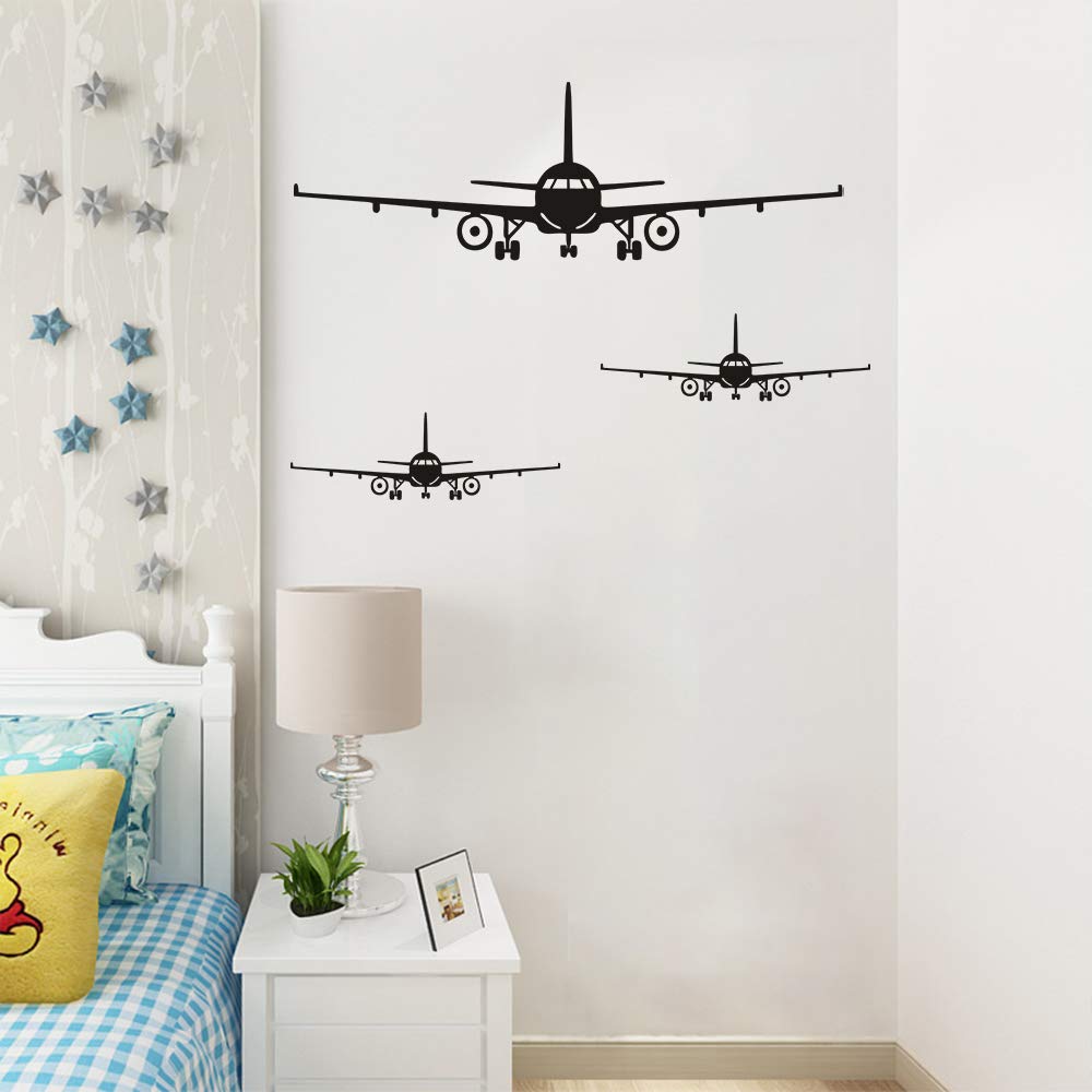 Lnrkai matte black airplane wall sticker on wall delivers sleek modern contrast.