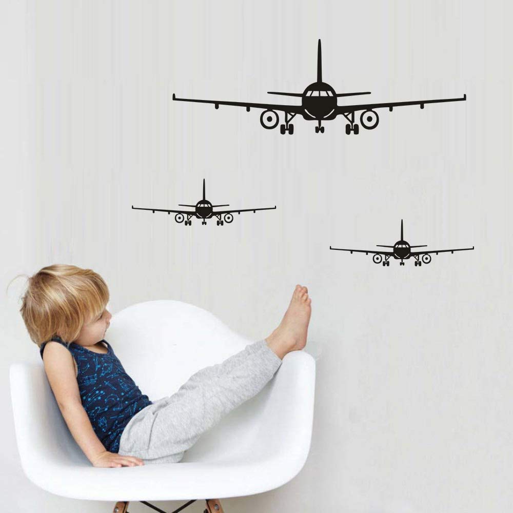 Lnrkai small airplane wall sticker on wall adds playful detail for kids' rooms.