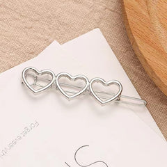LNYMZD hollow heart barrette set closeup ideal for everyday accessorizing.