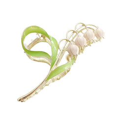 LNYMZD pink-gold lily-valley hair clip large for secure hold on thick hair.