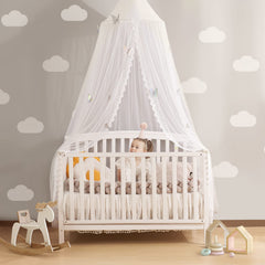 LOAOL Butterfly bed canopy over crib creates a cozy, fairy-tale sleep space.