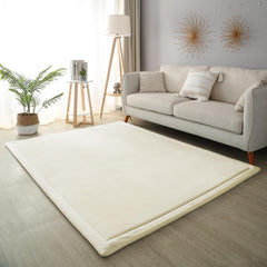 Loartee Coral Velvet Crawling Rug beige close-up fabric shows ultra-soft skin-friendly texture.