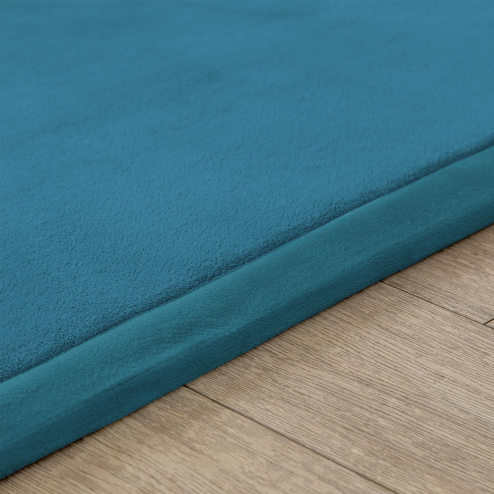 Loartee Coral Velvet Crawling Rug blue noise-dampening mat supports calmer sessions.