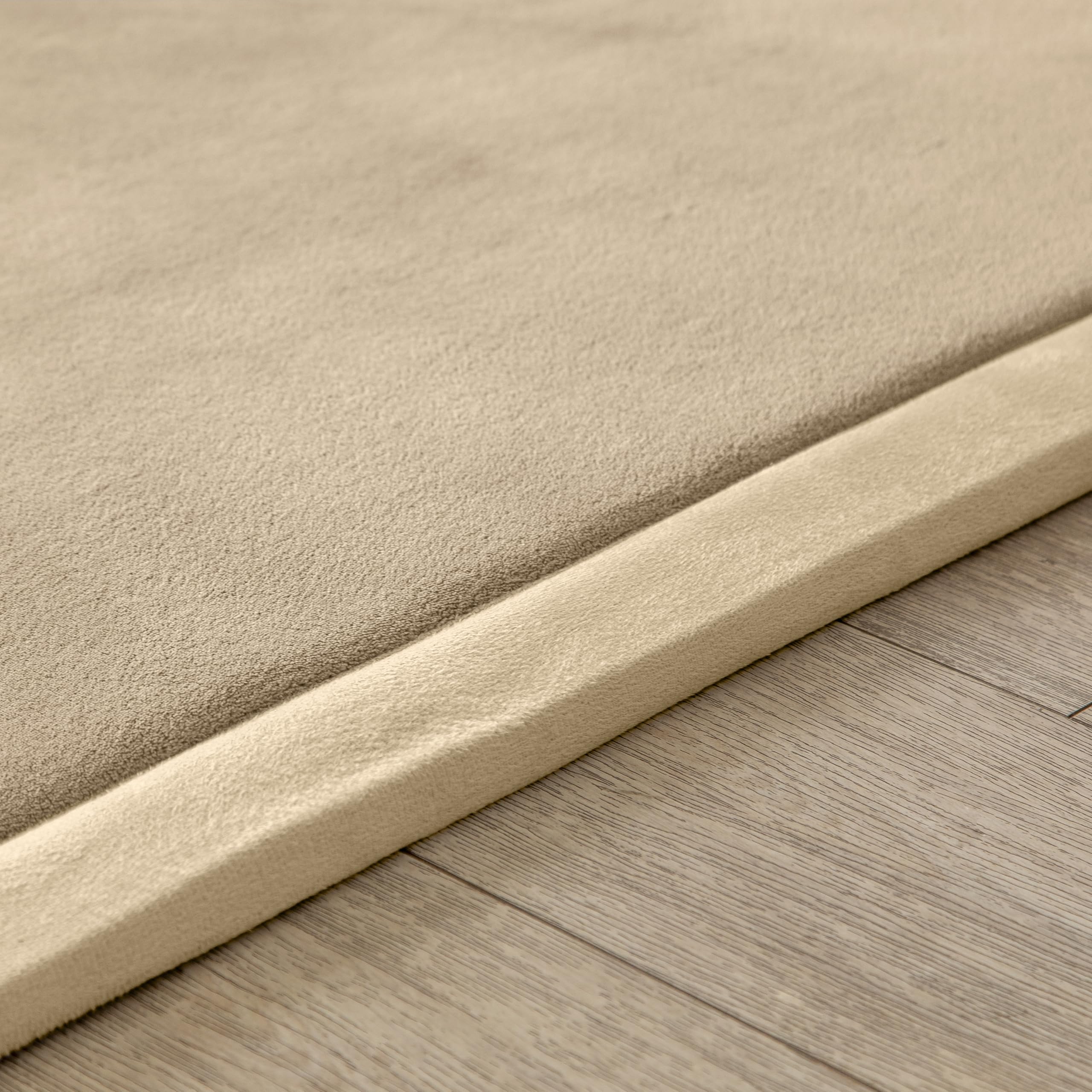 Loartee Coral Velvet Crawling Rug brown-tone color blends with modern nurseries.
