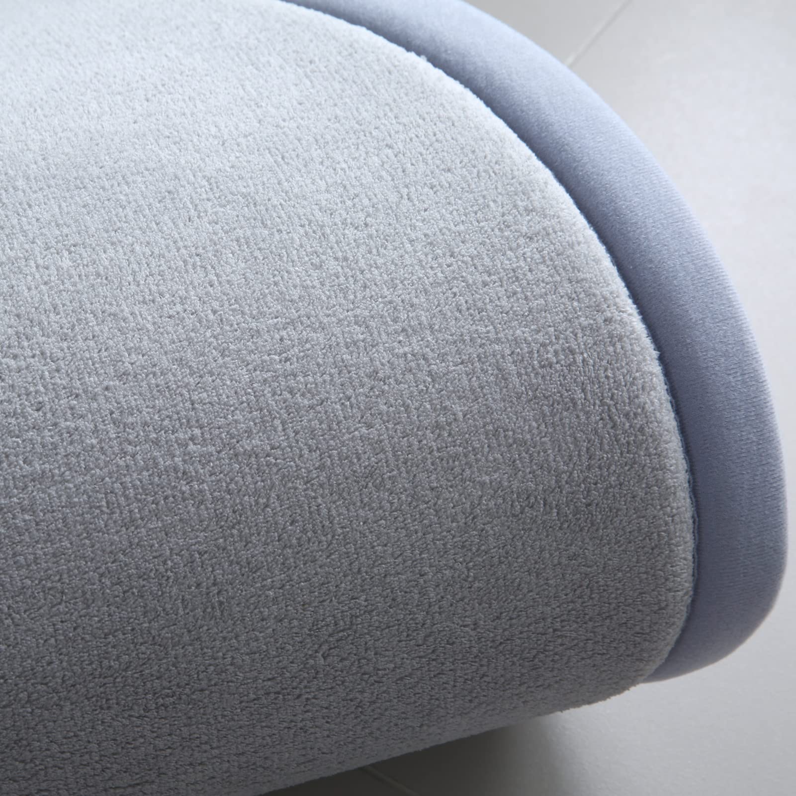 Loartee gray round rug demonstrates anti-slip base for safer play surfaces