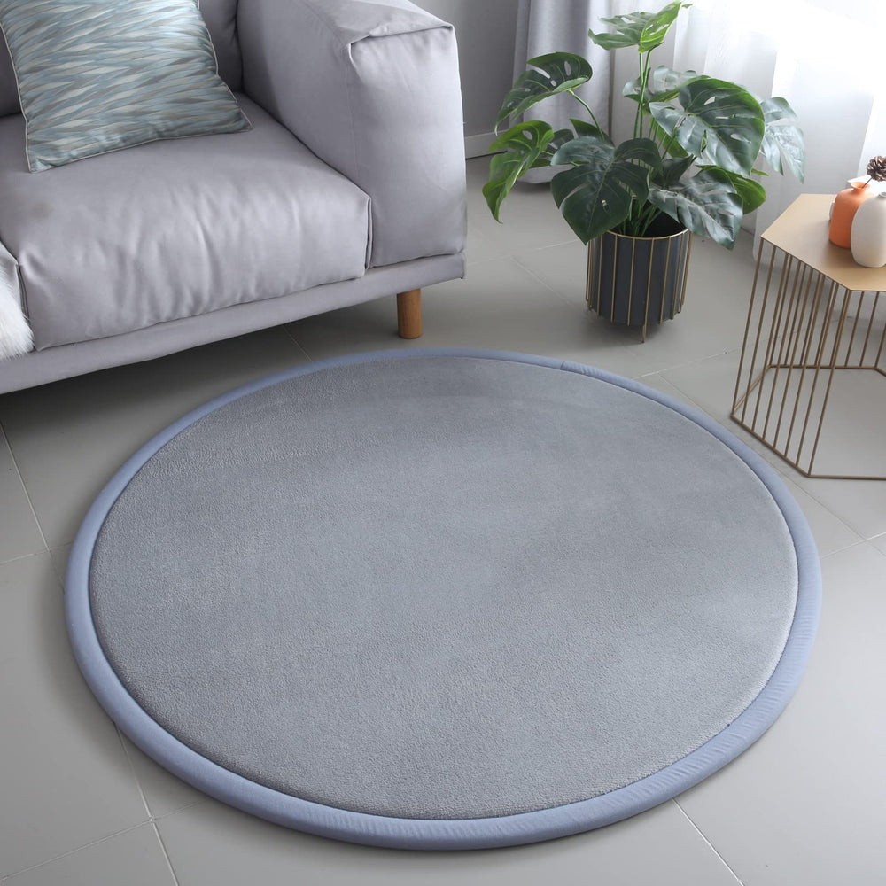 Loartee round rug memory foam core provides cushioned playtime under feet