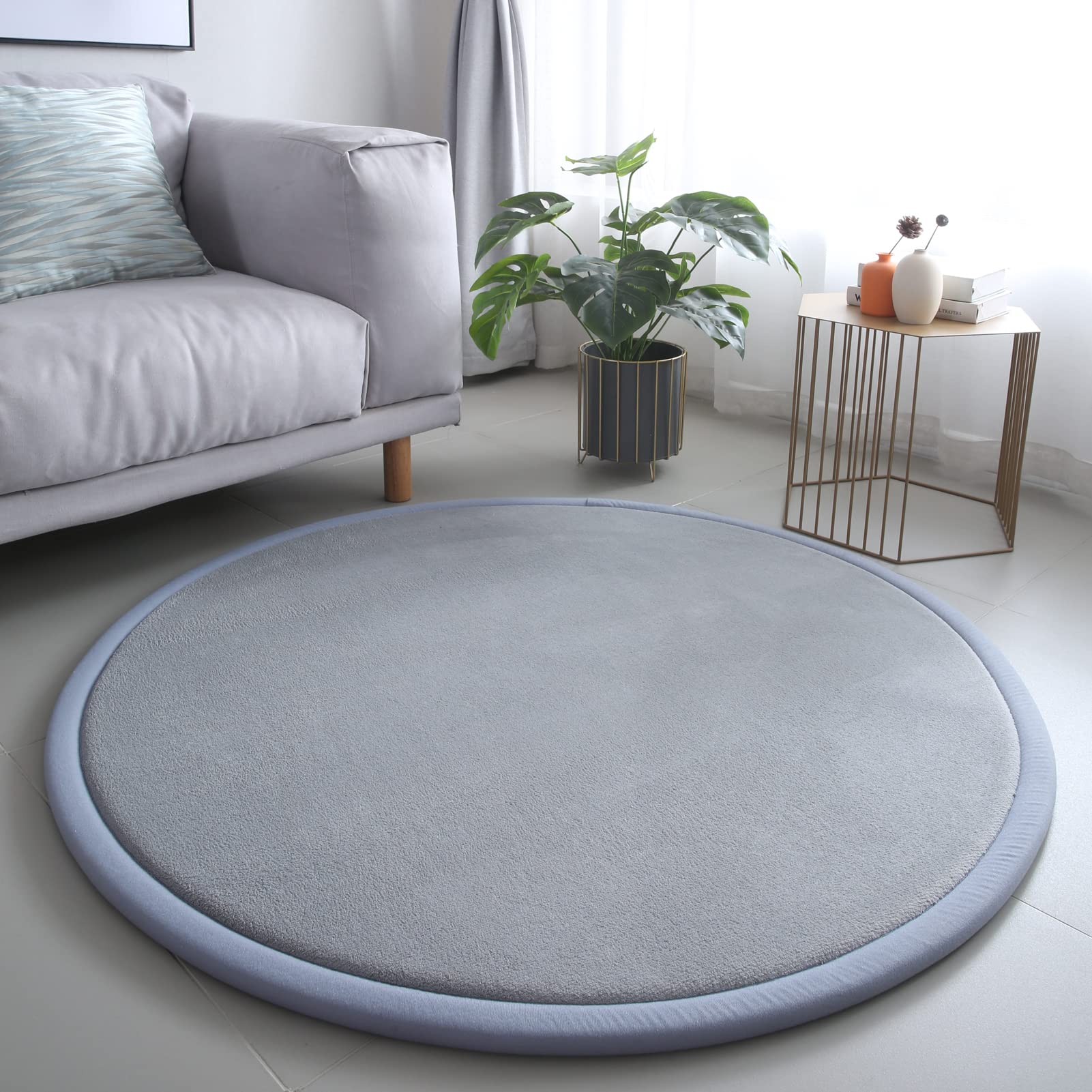 Loartee thick kids round rug in coral velvet shows ultra-soft texture for nursery play