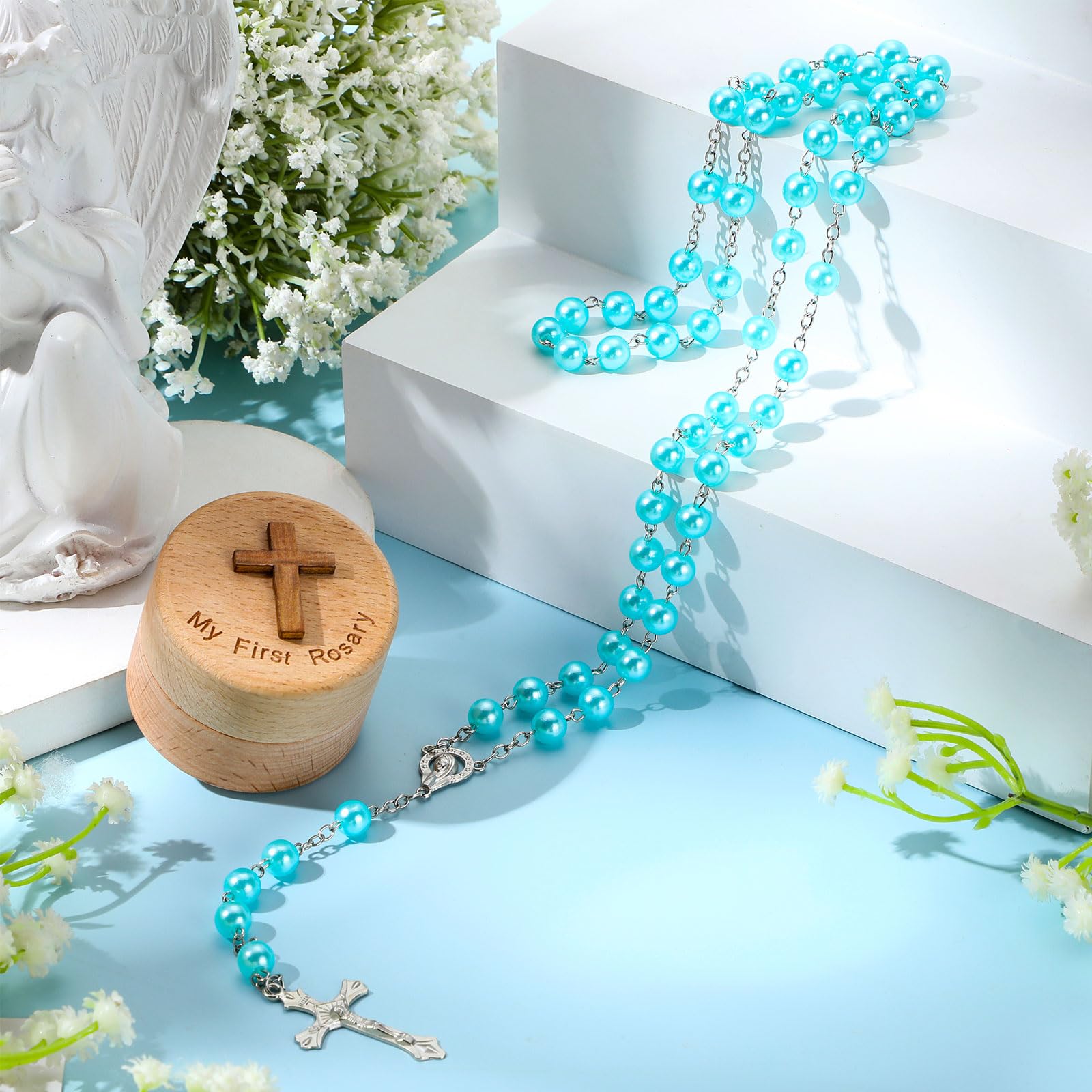 Loetere cross-detail blue rosary, emphasizes faith symbol for First Communion.