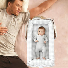 Loevin baby lounger with strap folded view for travel and storage