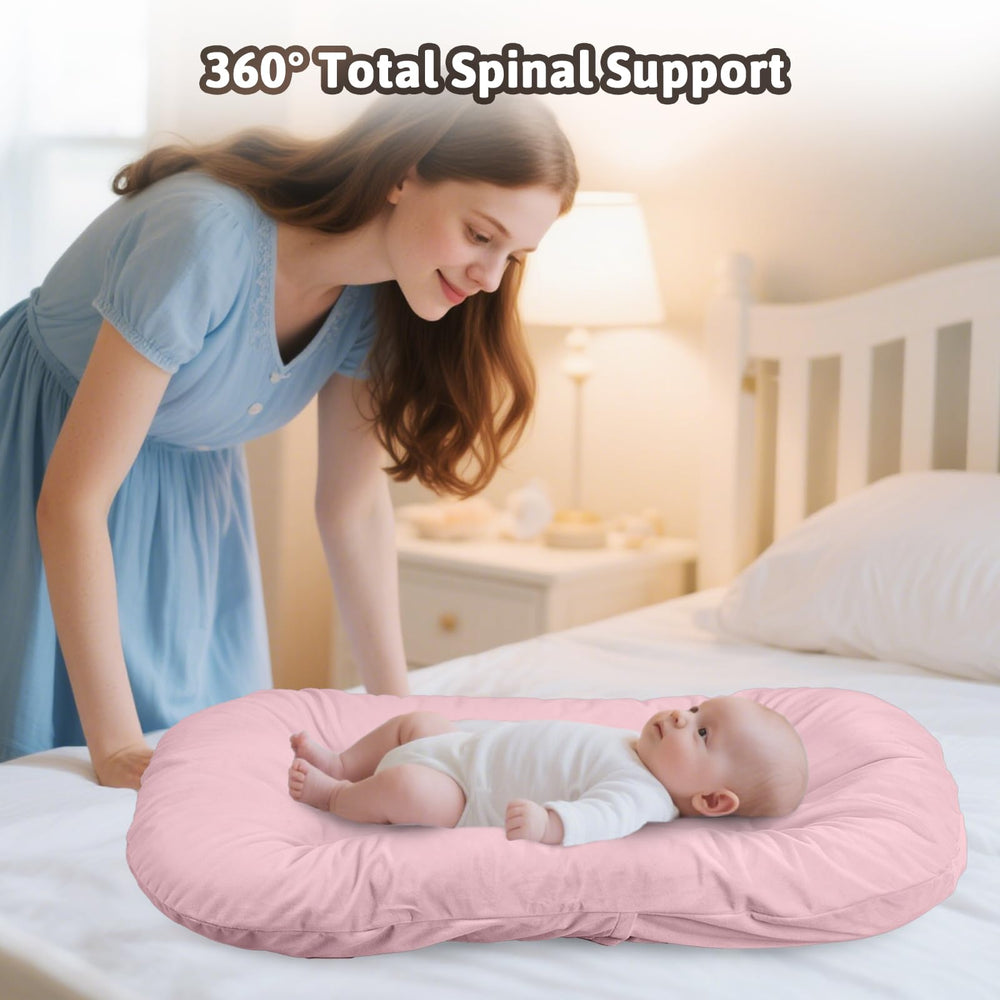 Loevin Baby Lounger removable cover being machine washed for easy upkeep