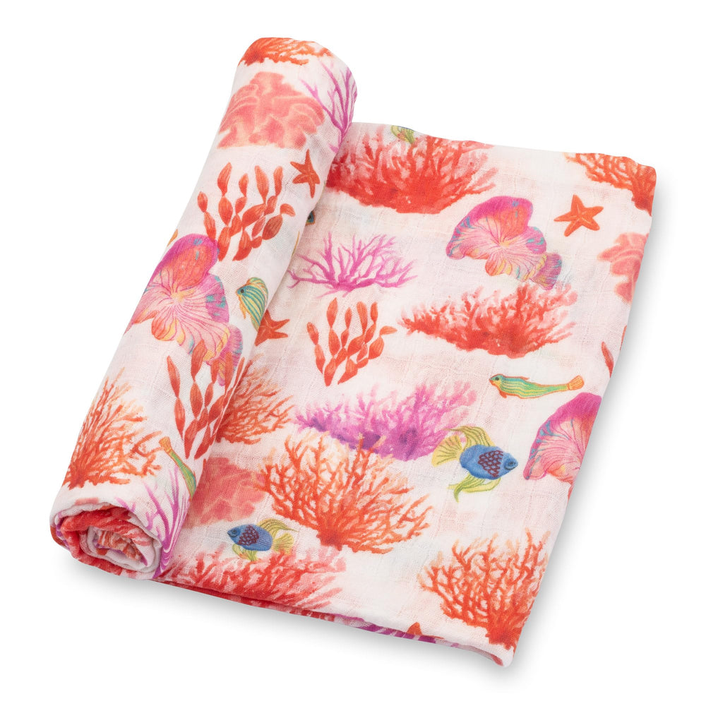 LollyBanks coral-print swaddle offers breathable, cozy comfort for naps.