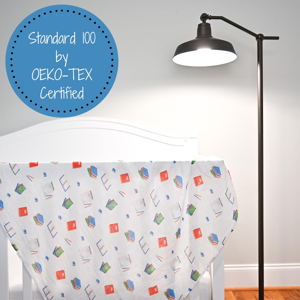 LollyBanks Books Print Swaddle Blanket care shot highlighting machine-washable ease.