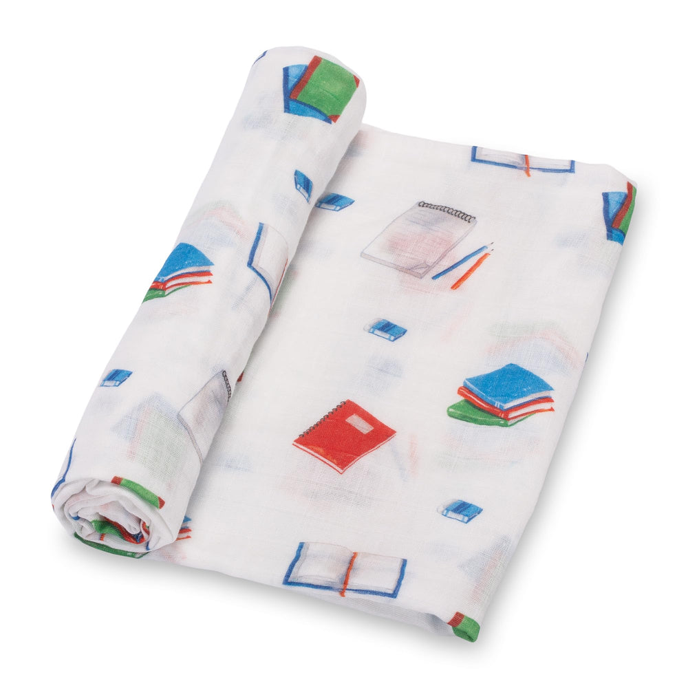 LollyBanks Books Print Swaddle Blanket folded shows soft, breathable cotton for secure swaddling.
