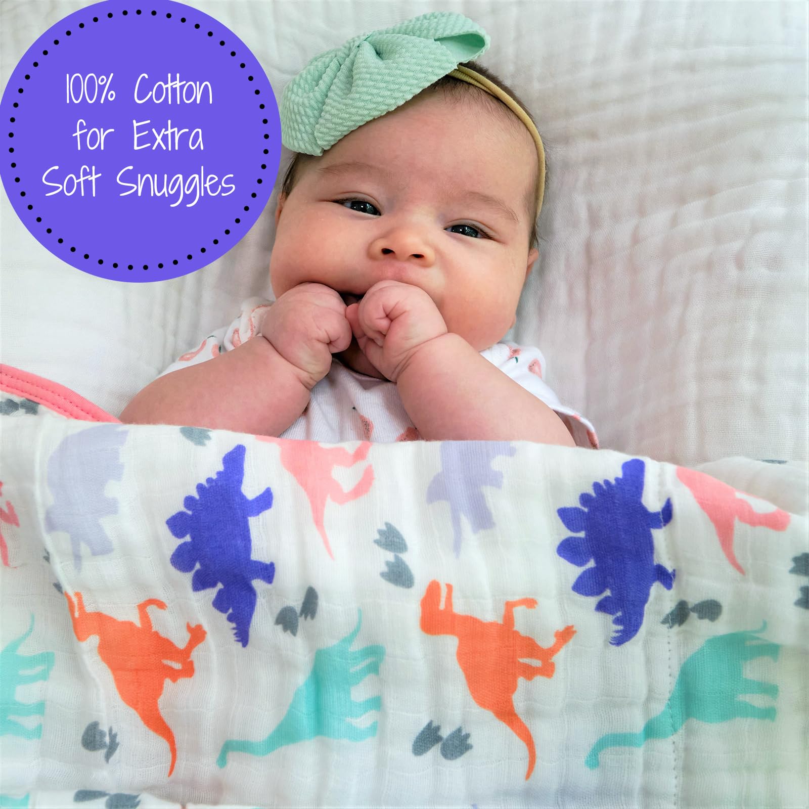 LollyBanks Dino Quilt baby in crib illustrating warmth and cozy snuggles.