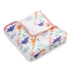 LollyBanks Dino Quilt closeup highlights soft cotton muslin texture ideal for delicate baby skin.