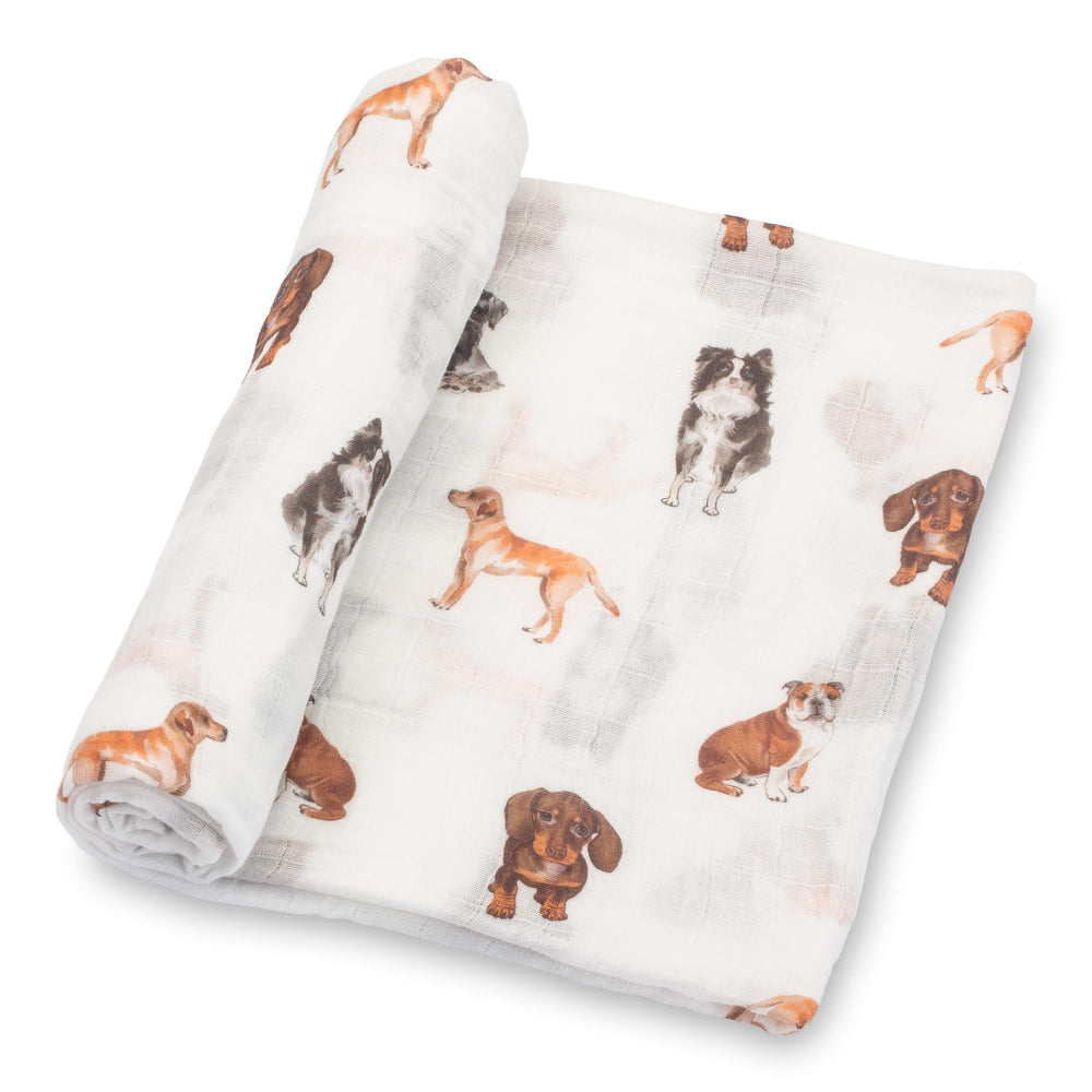 LollyBanks dog-print swaddle blanket showing cozy breathable cotton for secure newborn snuggles