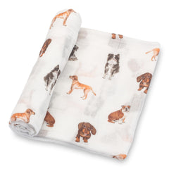 LollyBanks dog-print swaddle blanket showing cozy breathable cotton for secure newborn snuggles