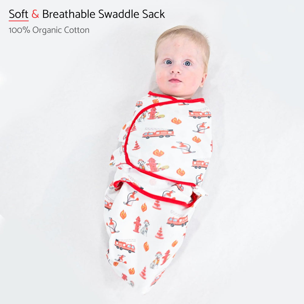 LollyBanks dog-print swaddle closeup fabric highlights 100% organic cotton texture