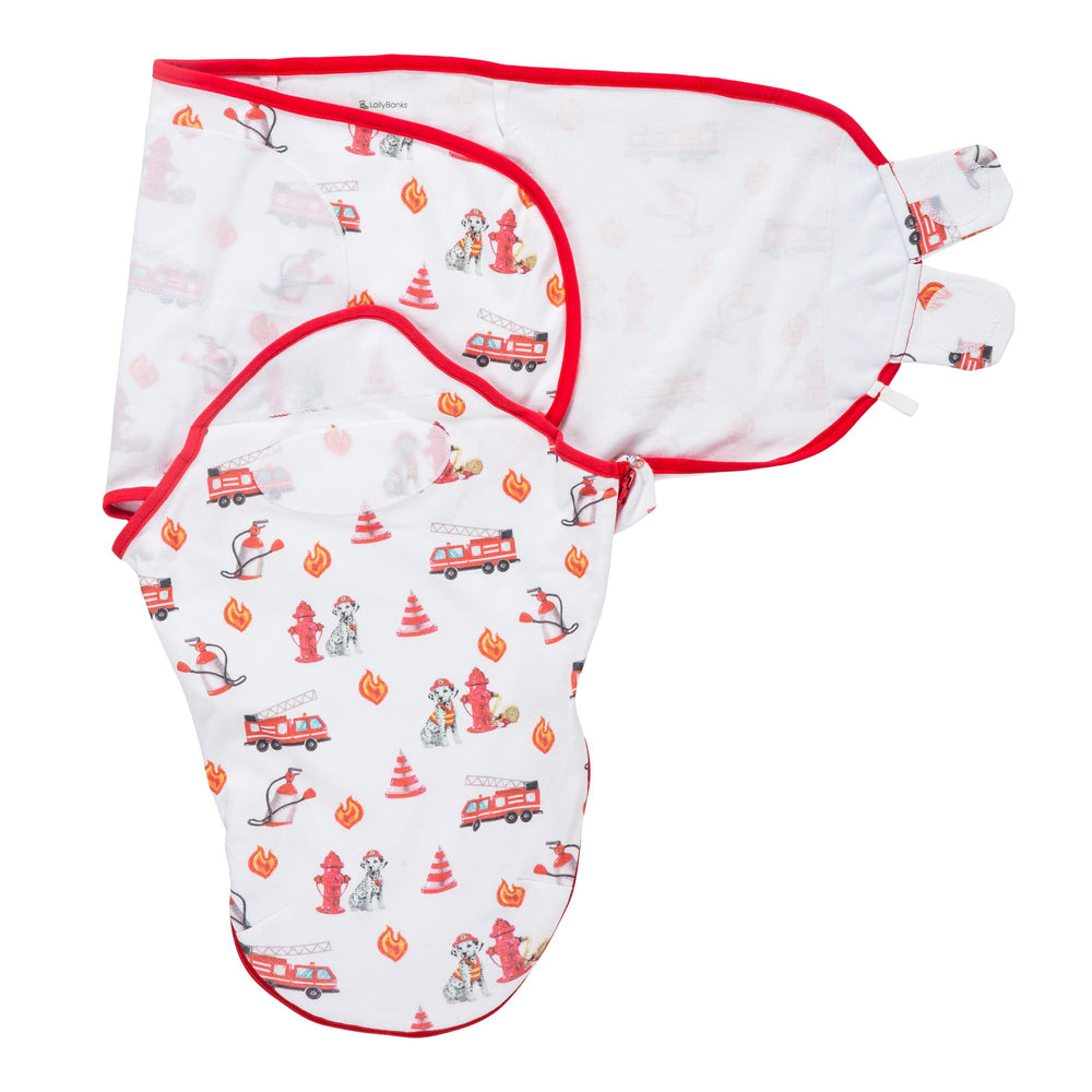 LollyBanks dog-print swaddle front view promotes ultra-soft organic cotton for newborn sleep