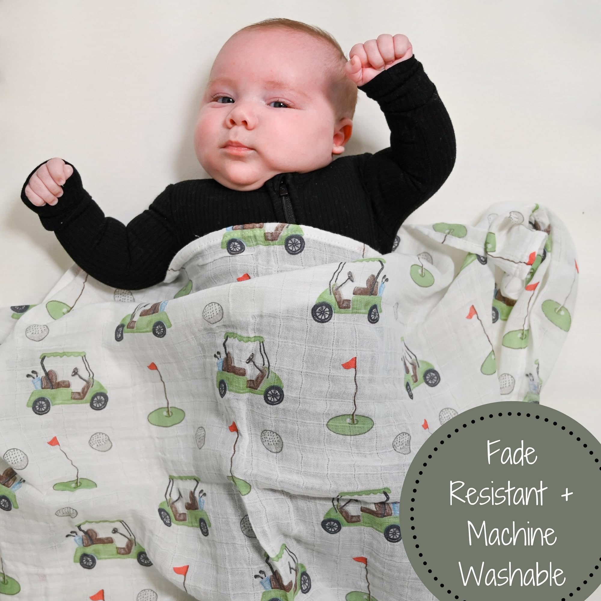 LollyBanks golf-print swaddle closeup fabric showing soft muslin texture