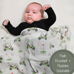 LollyBanks golf-print swaddle closeup fabric showing soft muslin texture