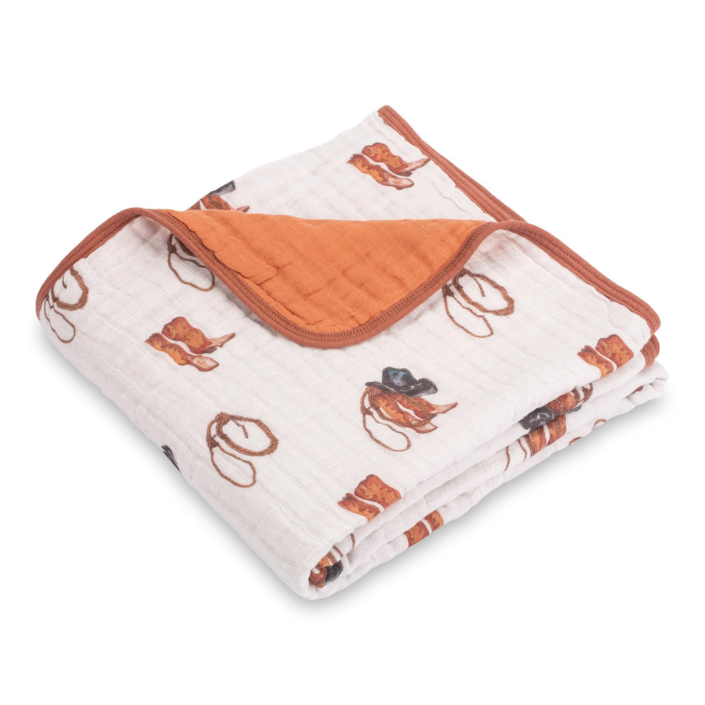 LollyBanks cowboy-print muslin baby blanket, warm and breathable for cozy snuggles