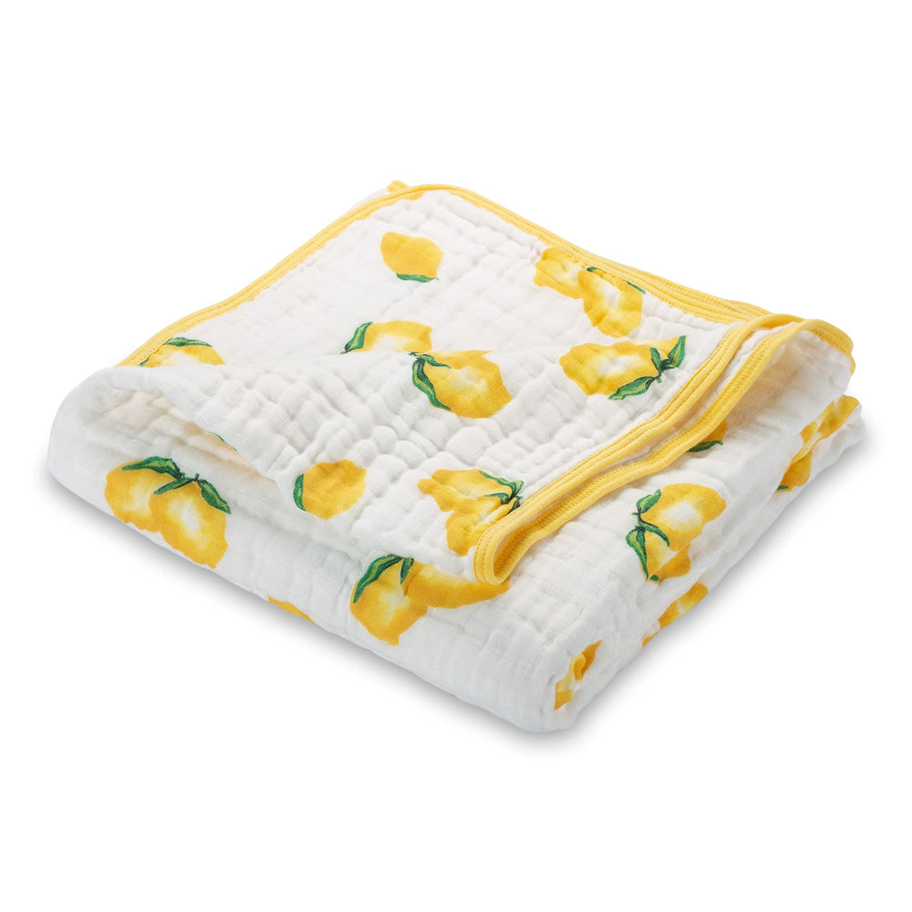 LollyBanks muslin baby quilt sunny lemon print adds cheerful nursery warmth.