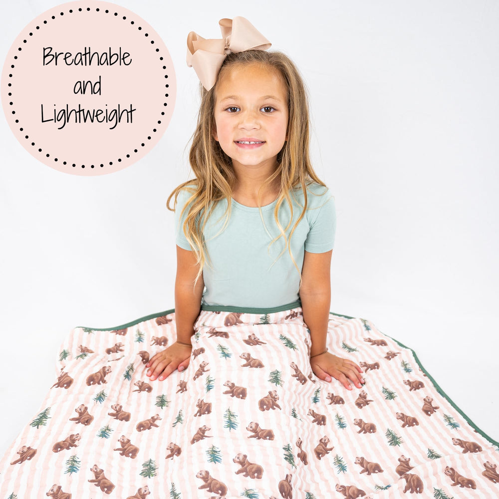 LollyBanks muslin quilt measures 47x47 inches for newborn to toddler use.