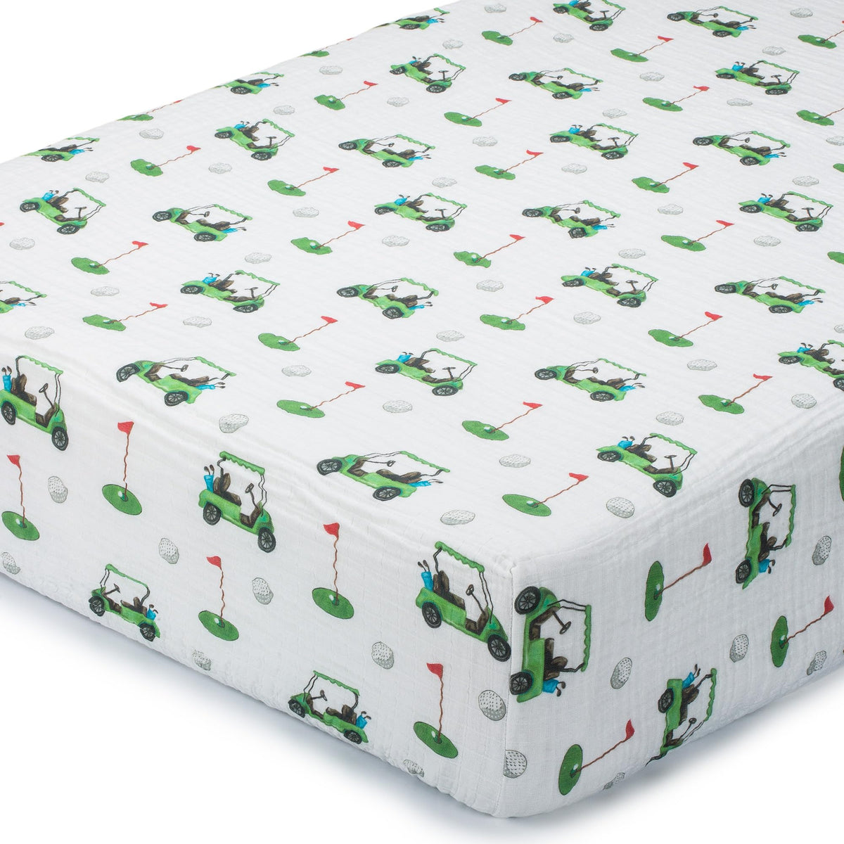 LollyBanks muslin crib sheet with golf cart print delivers breathable 100% cotton comfort for naps.