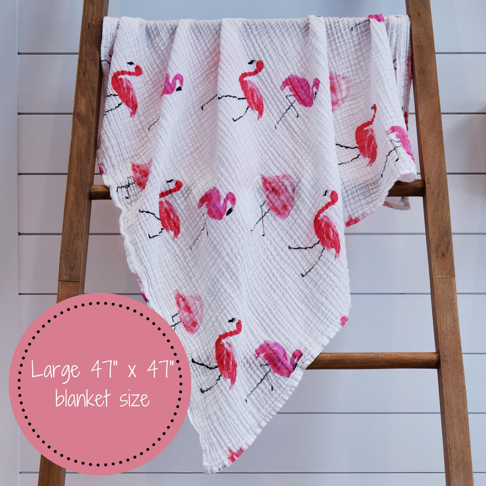 LollyBanks swaddle draped on crib to illustrate nursery decor appeal.