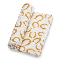 LollyBanks muslin swaddle blanket spread highlights fabric texture and size