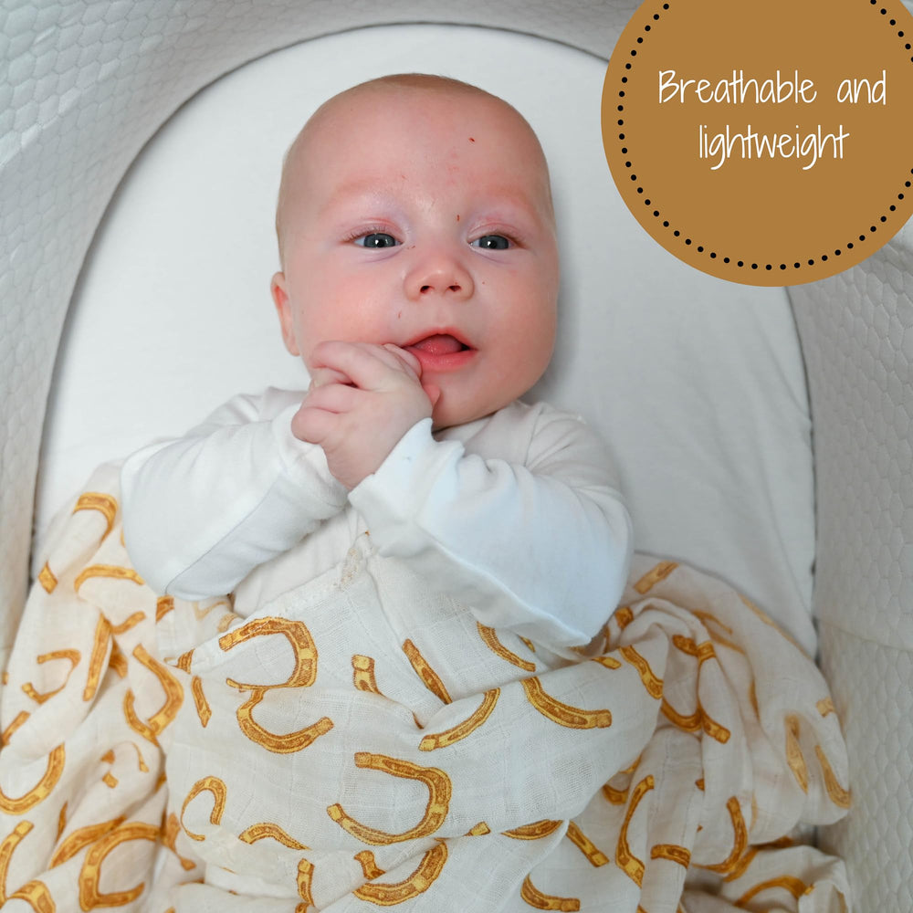 LollyBanks muslin swaddle care and washing details on packaging