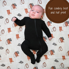 LollyBanks muslin swaddle wrapped around a baby for secure newborn comfort