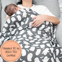 LollyBanks nursery decor ghost design on crib blanket for gentle seasonal style.