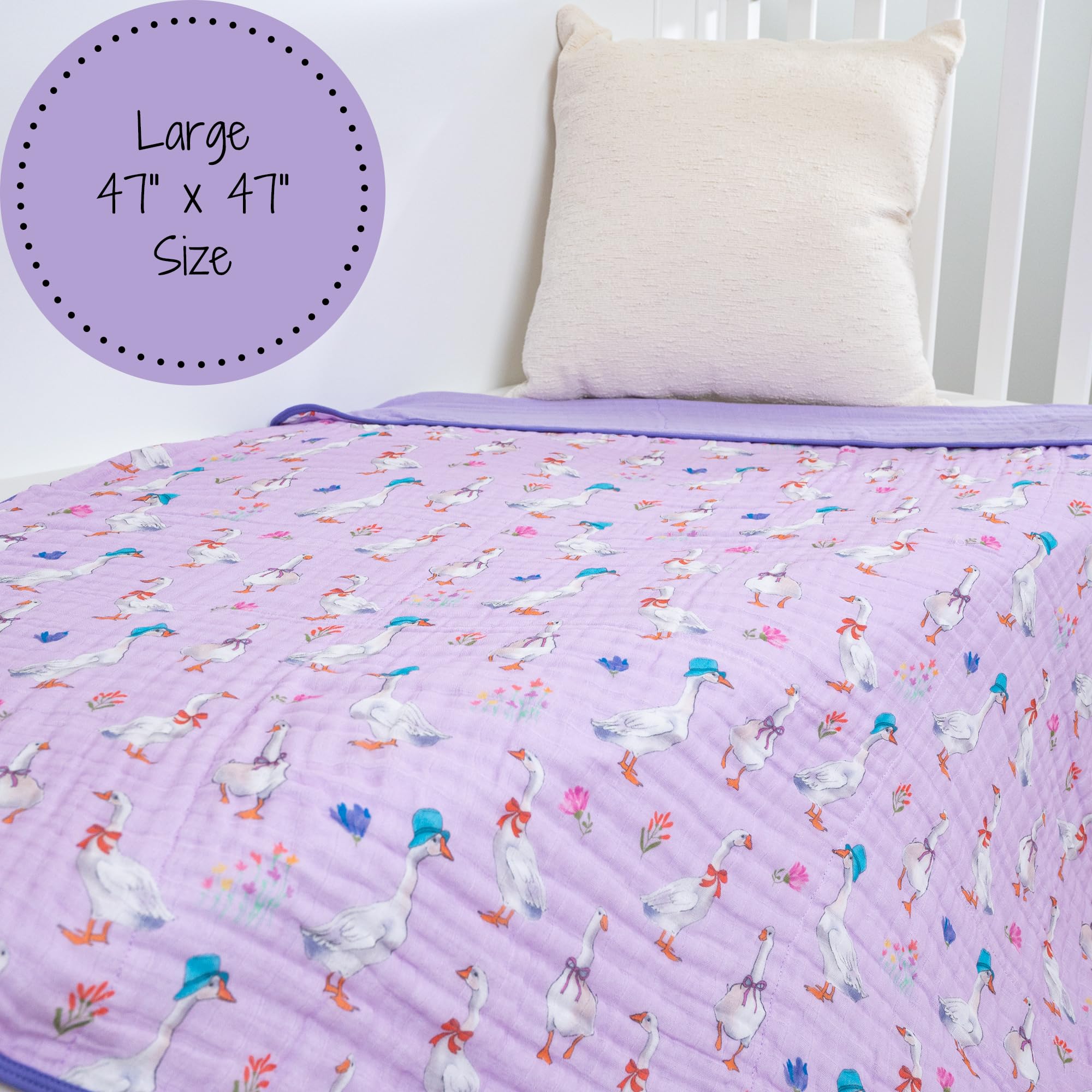 LollyBanks nursery snuggle blanket shown in crib for nap time