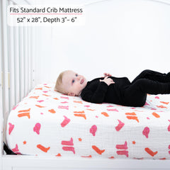 LollyBanks snug-fit crib sheet with elastic edges ensures secure placement through wiggles.