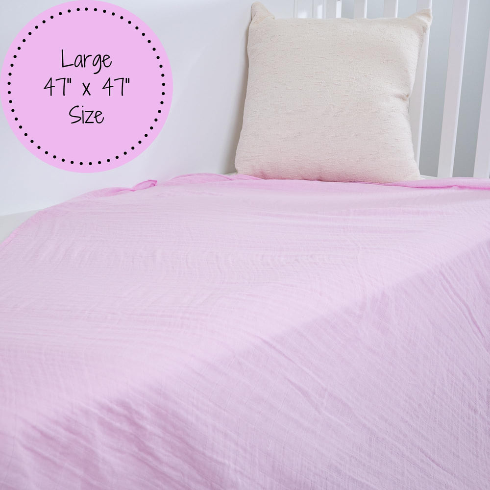 LollyBanks swaddle blanket used for baby girl snuggles and burps