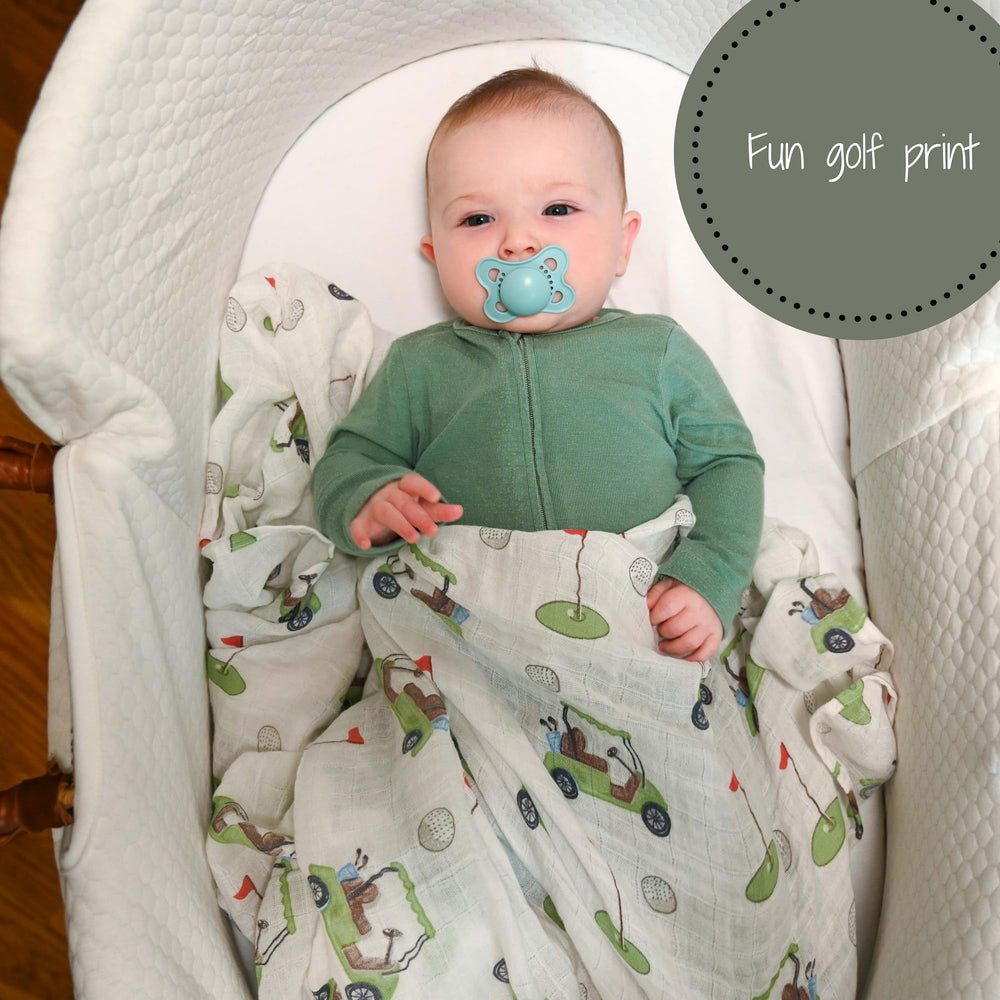LollyBanks golf-print swaddle wrapped around baby for a cozy fit