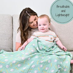 LollyBanks muslin swaddle 47x47 inches laid flat for versatile nursery use